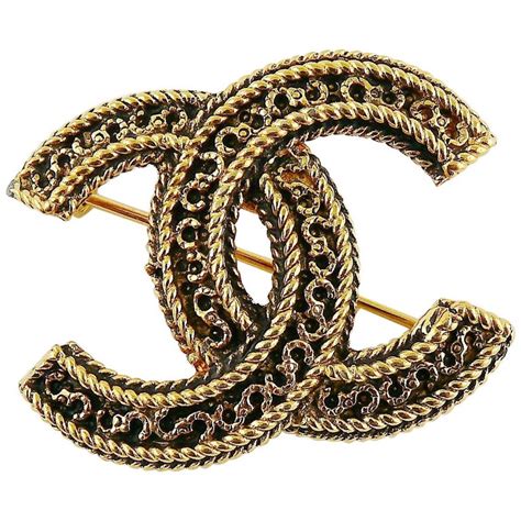 chanel gold cc brooch|vintage Chanel brooches.